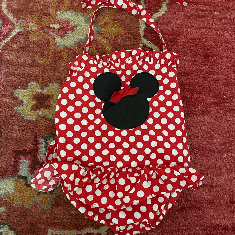Disney one piece smocked swimsuit. Great condition